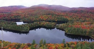 Aerial view of the Adirondack Interpretive Center nature area on a misty day during autumn in Upstate New York.
