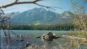 Beautiful Pyramid Lake and Mountain Nature in Jasper National Park - Blurred Branches Foreground, Slider Reveal