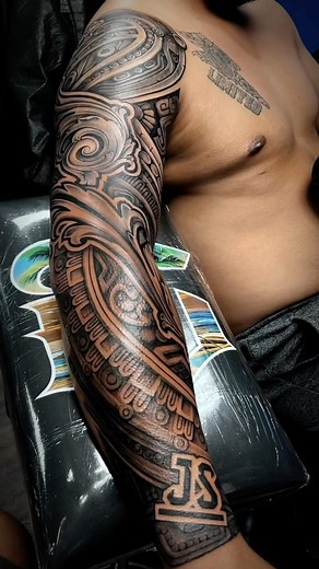 Dope custom Aztec Black and Grey sleeve by Artist @lalaellsworth #tribaltattoo #frostcityfamily #smalltalkbigwork #frostcitytattoo #blackink #sleevetattoo #aztec #aztectattoo #801 | Frost City Tattoo