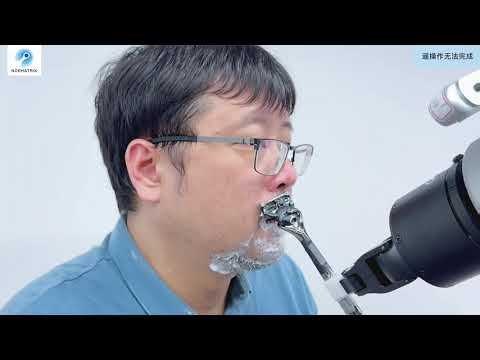 Would YOU Trust a Robot to Shave Your Face with a Razor Blade