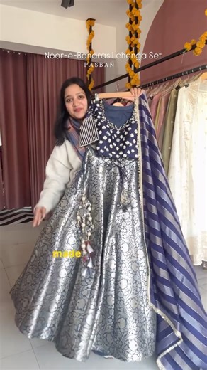 P A S B A N on Instagram: "Noor-e-Banaras — a handcrafted Banarasi lehenga created for women who understand couture-level detailing.🧿🪷 This ensemble features: • A pure Banarasi silk lehenga with a rich, structured fall • A pure silk blouse, fully hand embroidered with minute pearls, cutdanas & stones • A silk tissue jaal dupatta, lined and finished with elegant Karan lace • Heavy handmade latkans, crafted individually for a couture finish ✨ Custom Made at Pasban Studio Available in any size, t