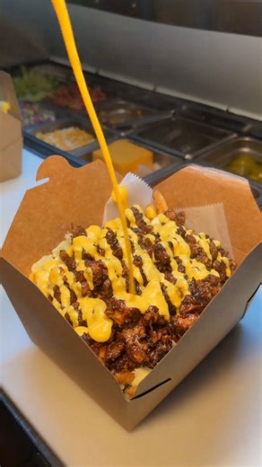 Jerk chicken with plantains and fries feast