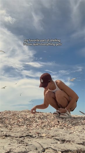 angela on Instagram: "I have one of those faces that says come talk to me but that’s okay bc sometimes people just need to chat to someone!!! 🫂 #shelling #florida #seashells #beach"