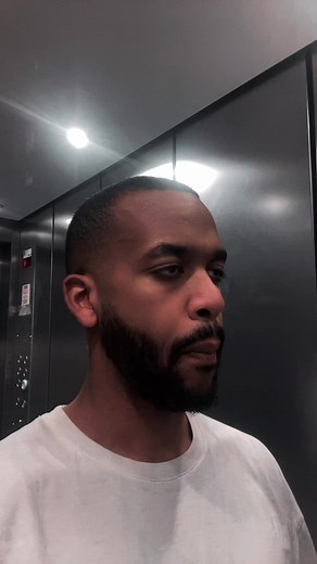 Adolescents Kissing in Elevator Mirror Video