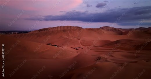 Dune buggy ecotourism adventure in sandy dunes of Huacachina desert oasis, drone