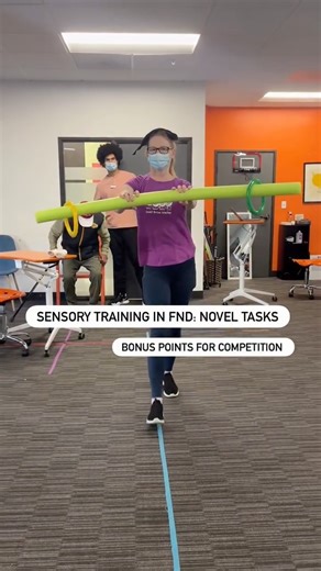 Dr. Julie Hershberg on Instagram: "Sensory Training in FND: The Power of Novel Tasks Bonus points for adding a little competition! Especially helpful for functional dystonia and functional movement disorders. I love this video because it highlights just how many sensory tools are being used - compression, a weighted vest, weight on the head AND a novel task! In this case, competition: don’t let the rings fall off, or see how many skip-its you can do in a row! So why do novel tasks work? FND is w