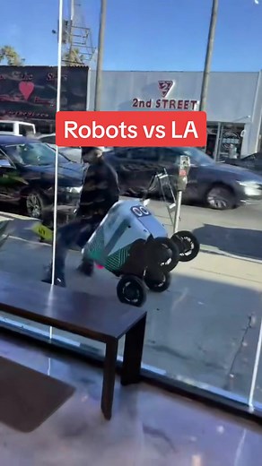 Food delivery robots take to the streets of LA. Cant LA defeat AI? Artificial intelligence does not stand a chance. #artifialintelligence #robot #robotics #automation #fooddelivery #ubereats