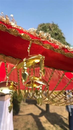 Mode Mantra on Instagram: "✨ Mode Mantra Bridal Entry Chadar ✨ Where tradition meets handcrafted elegance 💫 Highlights of this Custom-Made Beauty: • Rich velvet red base symbolising love & new beginnings • Intricate gold sequin lace detailing along the borders • Luxe hanging gold tassels adding royal movement with every step • Soft red mesh drape for a dreamy, ethereal bridal aura • Falling golden bead strings creating a magical curtain effect • Handcrafted embellishments that shine beautifully