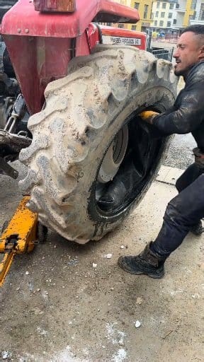 Ferguson tractor tire repair. | Kara Wiseman