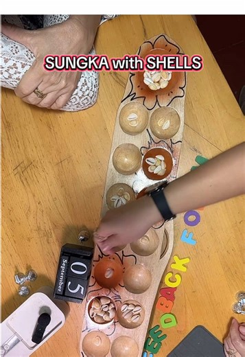 Discover Sungka with Shells: A Filipino Board Game Guide