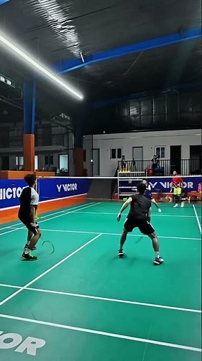 Exciting badminton men's doubles match