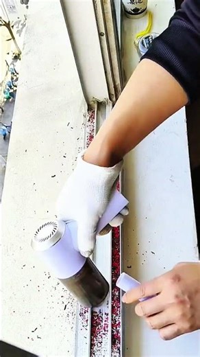 Vacuuming debris from sliding window track