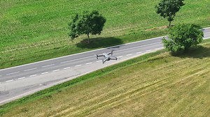 quadcopter-drone-with-camera-hovering-road-recording-traffic-static ...