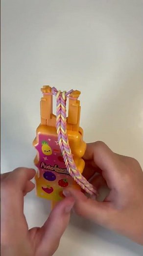 Sugar Loop is here! Watch me create a fun, colorful rainbow loom bracelet with my auto loom!