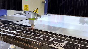Modern automated laser cutting machine work for processing metal products.