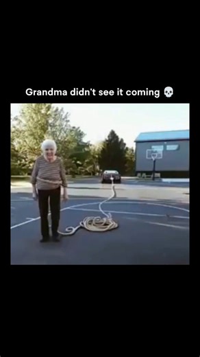 Wild Videos on Instagram: "The post depicts a staged prank sequence where an elderly woman appears to tie a rope around her foot, with the other end connected to a car, immediately creating a sense of danger as the vehicle begins to move. Onlookers panic, expecting her to be dragged along the ground. The tension collapses into a reveal when the car pulls forward and nothing happens — the rope was never actually tied to her leg. The woman stands laughing, exposing the setup as a misdirection-base