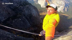 Daredevil shows his perspective from 300 metre slackline above Yosemite Valley, California