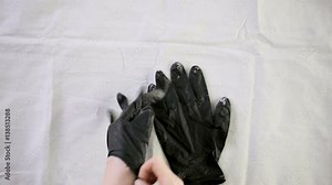 Paint in metal paint can and painters tools on a canvas drop cloth