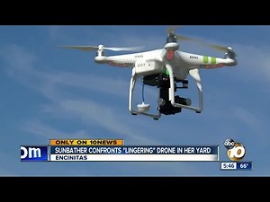 Sunbather confronts drone in her yard
