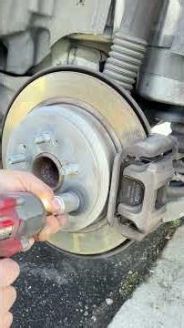 Cleaning rust off of wheel studs and rotors with Hub Buddy & Impact #tireguy #mechanic #rotatingtire