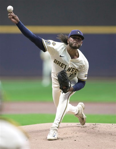 How do national writers grade the Freddy Peralta trade?