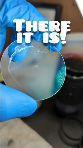 Taking apart a camera lens to clean it