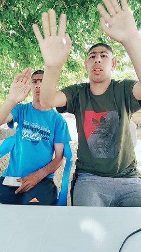 Engaging Hand-Clapping Game Under a Tree