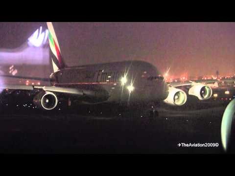 A380 - Amazing strobe - beacon light effects - Window view from a another EK A380