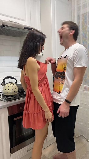 Playful Kitchen Moments with a Sunset Graphic Tee