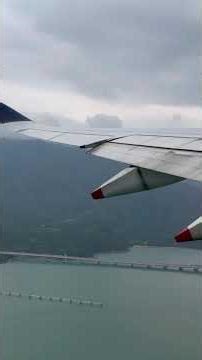 Seat A Window view while the aircraft taxied NE along runway 07C and Taking off from HKG airport