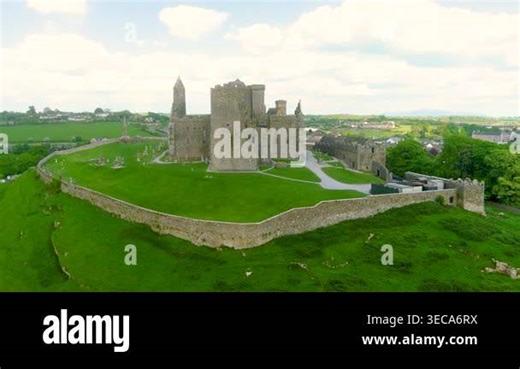 Aerial orbit view of the Rock of Cashel, aka Cashel of the Kings and St. Patricks Rock, a historic site located at Cashel, County Tipperary. One of the most famous tourist attractions in Ireland Stock Video Footage - Alamy