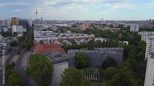 Smooth aerial top view flight Jewish Museum city Berlin Libeskind Building drone