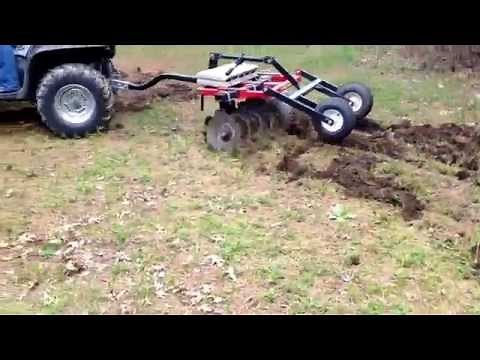 ATV putting in food plots with a Howse ATV disc harrow.