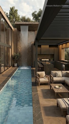 A Backyard Pool & Outdoor Kitchen Transformation | Dream Makers Studio This backyard transformation brings together a modern swimming pool, a calm waterfall, and a functional outdoor kitchen designed for real homes. A clean, practical outdoor space created as inspiration for anyone dreaming of upgrading their backyard into a place to relax, gather, and enjoy everyday life. #BackyardDesign #BackyardTransformation #OutdoorLiving #OutdoorKitchen #SwimmingPoolDesign #ModernBackyard #GardenIdeas #Hom