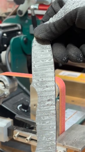 Chris | Woodworker Maker on Instagram: "Utilizing my belt grinders and making quick work of shaping this knife. These machines make this process so much fun. You can really hog off some material fast. I’ll use them for grinding the bevels which will be next. #knifemakers #beltgrinder #damascusknife"