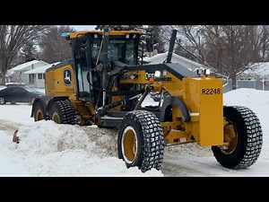 Major Snow Removal Operation With CAT and Deere Graders