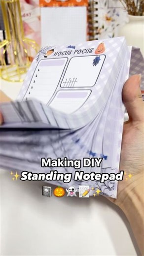 Planify Pro - Planner Design Program on Instagram: "Making a DIY Standing Notepad 🎃🍂📓 This one can also be propped up with the Elastic in the back 🥰✨ Materials & Equipment: - 70gsm paper - Chipboard - Elastic & Eyelet - White Glossy Sticker Paper This notepad is in the A6 size. The cover designs and inserts have been made and exported from Planify Pro. If you’re a seller interested in using the templates commercially, check out the business plan ✅ it comes with 500+ patterns, graphics, fonts