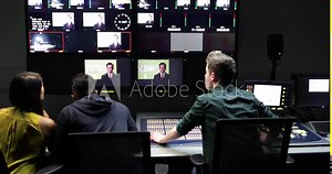 Operators in a control room at a television studio