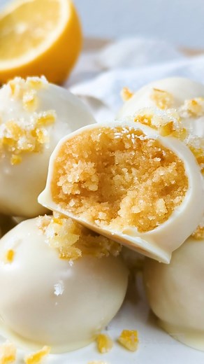 Made with gin, tonic, lemon and Madeira cake - and coated completely in white chocolate 😍. Get the recipe here >> https://www.taste.com.au/recipes/gin-tonic-truffles/535oqvsq | Taste.com.au