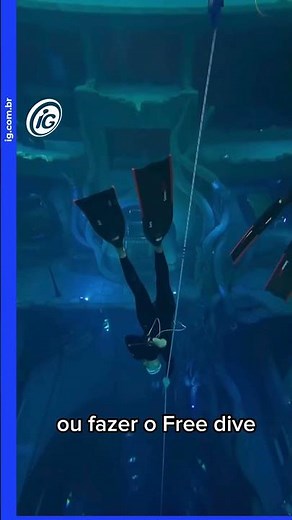 Diving inside a 20-story building? Tourist shows off the world's deepest swimming pool.