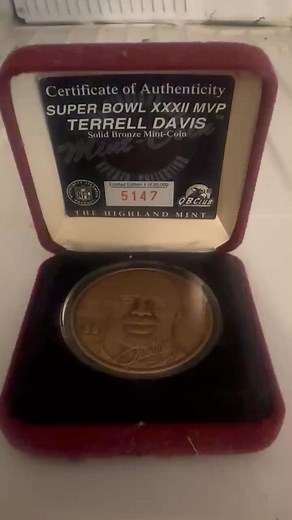 $20 • The Highland Mint Coin Terrell Davis 1998 MVP 24K #ed This beautiful Highland Mint coin features Terrell Davis, the Denver Broncos football player who won the MVP award in 1998. The coin has a 24K gold overlay medallion with a unique design and is accompanied by a certificate of authenticity (COA). This officially licensed vintage sports memorabilia is a must-have for any Denver Broncos fan or sports collector. https://www.facebook.com/marketplace/item/1735748410410164/ | Bobby Dudeey