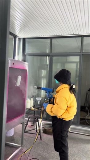 Today, I am teaching a customer from Saudi Arabia how to operate the electrostatic spraying process