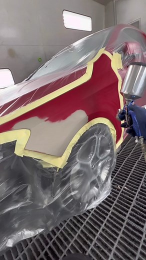 Professional Automotive Painting Process of a Red Car