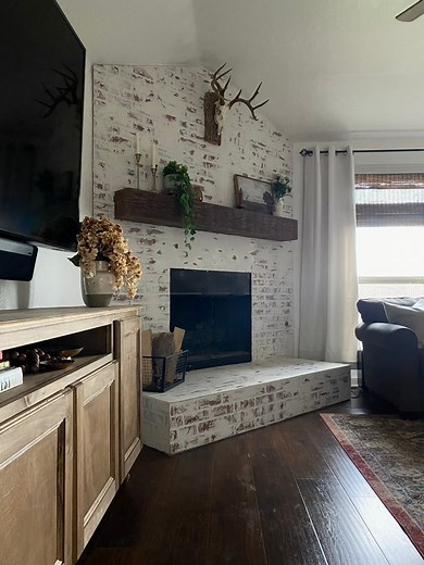 119K views · 2.1K reactions | Fireplace makeover with faux brick paneling. I still love this fireplace but I can’t wait to do something more permanent, like putting up stone that’s like what I used for my kitchen backsplash!  One day! I’ll just dream of it for now!#fireplace #fireplacemakeover #firplacedesign #diyfireplace #brickpaneling #fauxbrick | Life Is What You Make It | Facebook