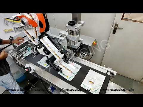 Automatic sticker label applicator on pouches, cartons | Label pasting machine with auto conveyor