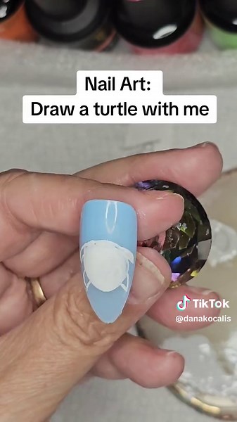 🌞 Get ready for summer with these cute tie-dye turtle nails! 🐢💅 Perfect for your 2024 nail art inspiration! #SummerNails #NailArt2024 #TieDyeTurtles