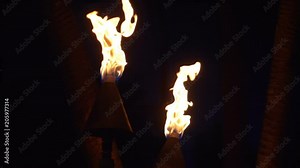 Professional video of Tiki Torch Flames Waikiki beach in Honolulu Hawaii in slow motion 180fps