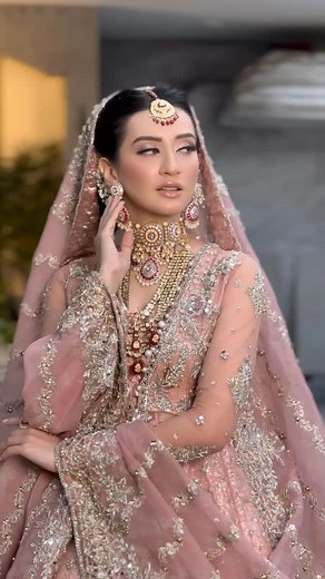 16K views · 279 reactions | Dreamy, Whimsical, and Absolutely Stunning  Our HKS bride is a vision of elegance on her special day!  #HKSBride #DreamyLook #makeup #makeuptutorial #makeupartist #WeddingMakeup | Hifsa Khan Salon & Studio | Facebook