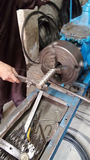 Making a steel wire spring on lathe machine #short