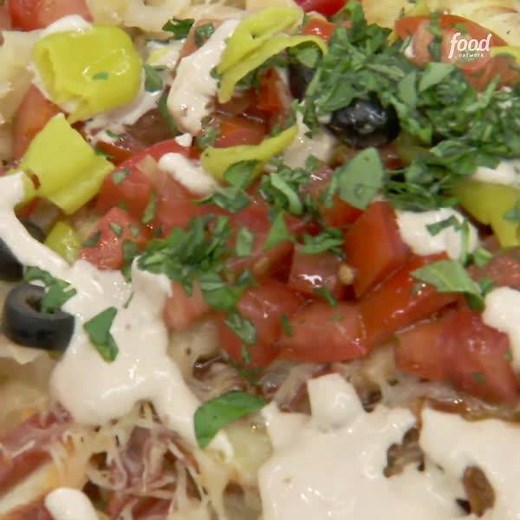 498K views · 2.6K reactions | All your favorite Italian flavors... in a tower of NACHOS!  #TheKitchen > Saturdays at 11a|10c Save the recipe: https://foodtv.com/2EHFOxg! | Food Network | Facebook